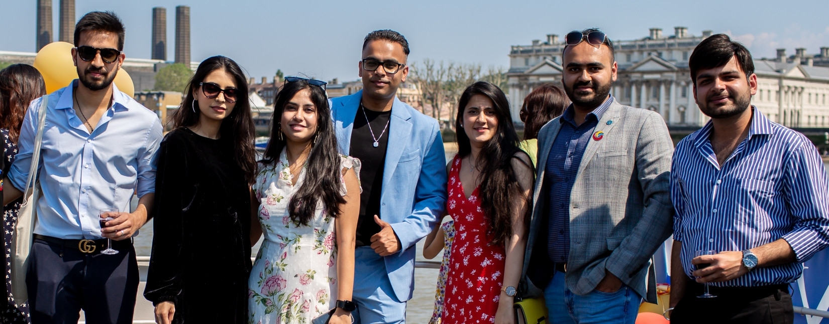 Alumni meetup at a scenic waterfront location